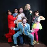 A group of actors from the cast of Yippee Ki-Yay Merry Christmas! A Die Hard Musical Parody